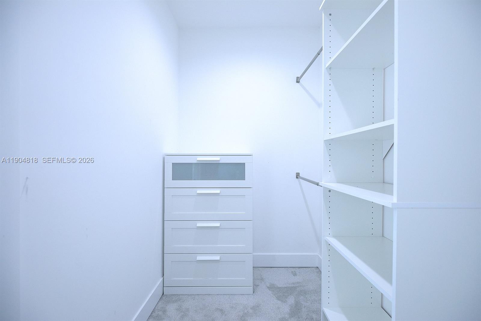827 Renault Avenue Sebring, FL 33872 - Photo 22 of 27 a view of an empty walk in closet