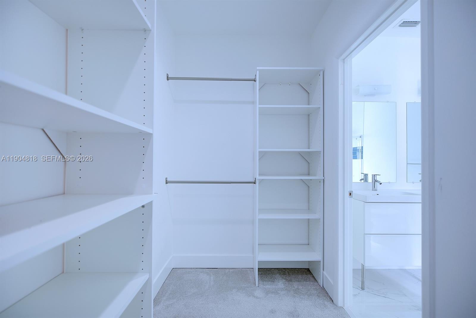 827 Renault Avenue Sebring, FL 33872 - Photo 23 of 27 a view of an empty walk in closet