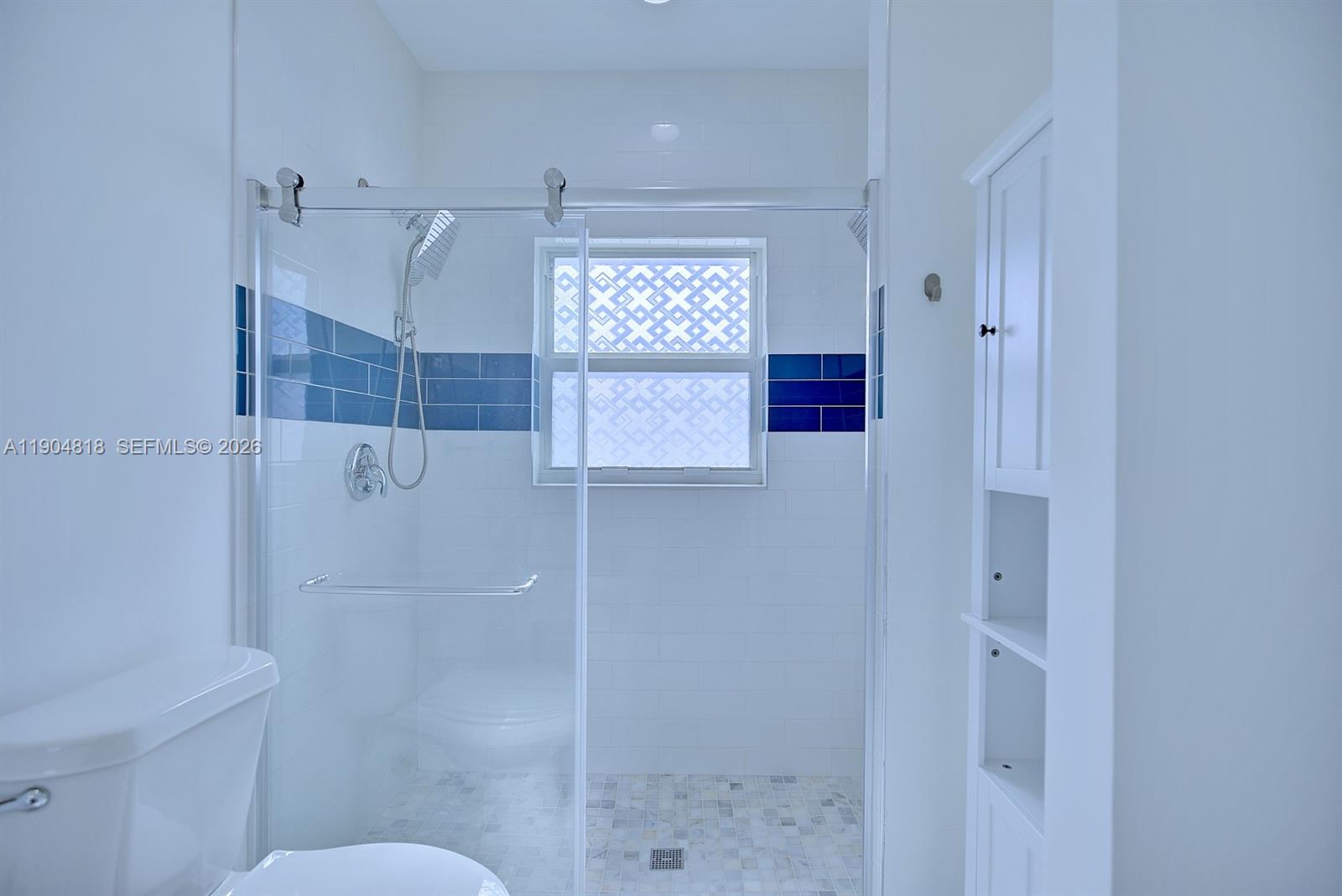 827 Renault Avenue Sebring, FL 33872 - Photo 25 of 27 a bathroom with a shower and toilet
