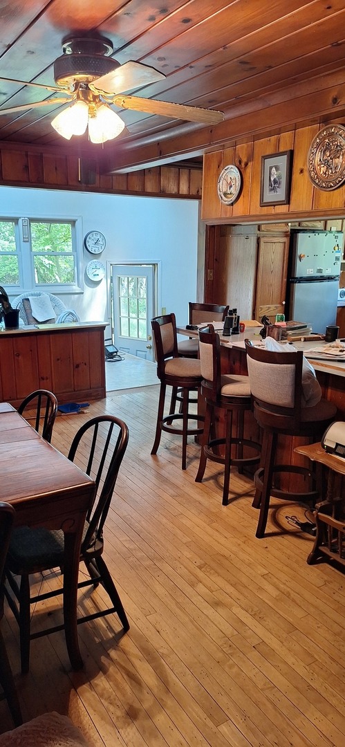 6704 South Rawson Bridge Road Cary, IL 60013 - Photo 5 of 10 a view of a dining room with furniture and chandelier