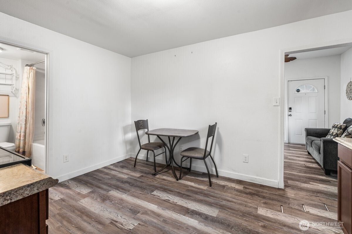 1916 Martin Luther King Junior Way Tacoma, WA 98405 - Photo 10 of 17 a workspace with furniture and wooden floor