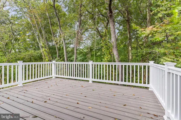 a view of a wooden roof deck