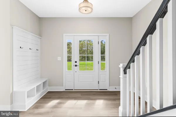 a view of entryway with stairs