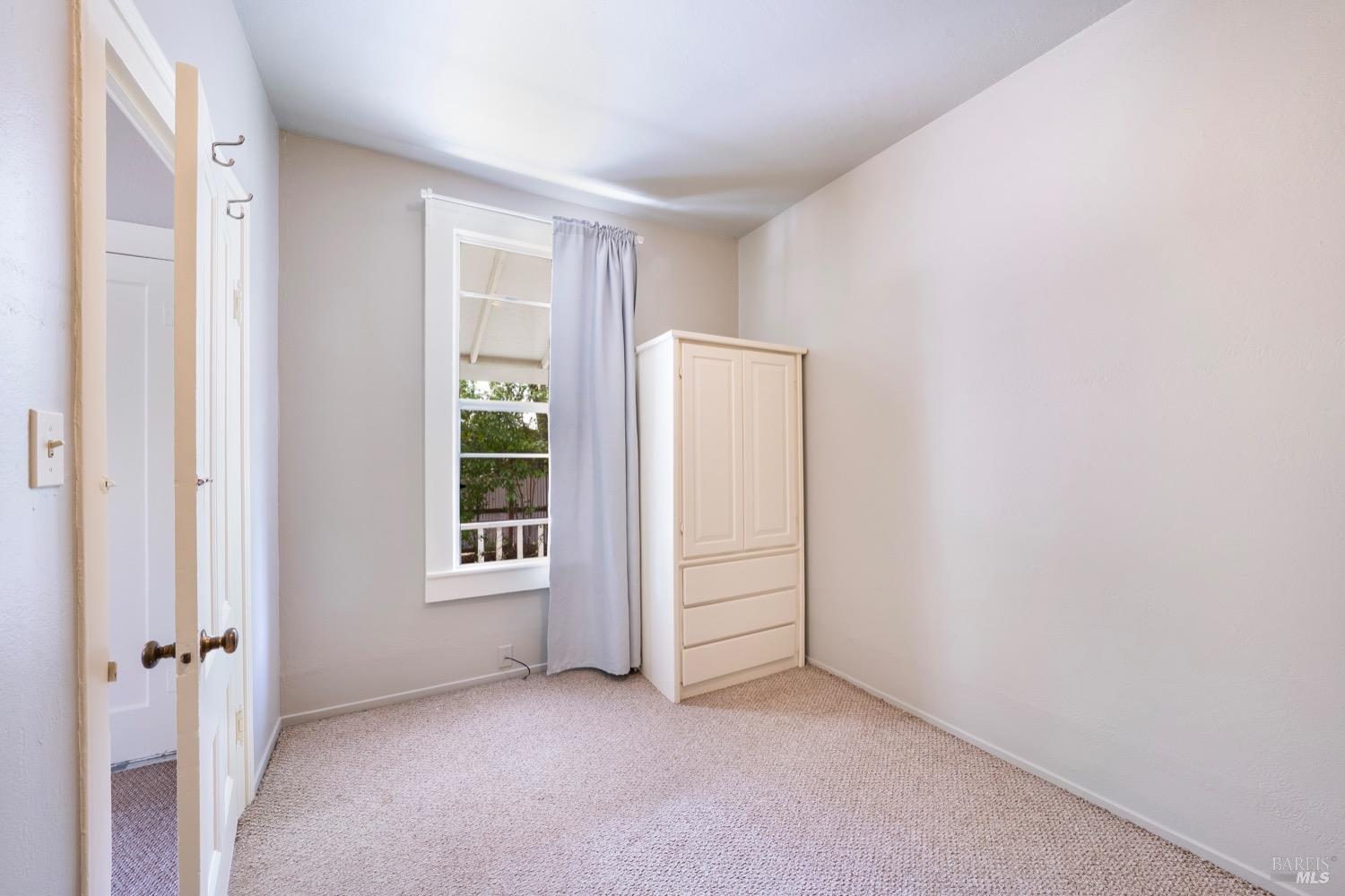 1664 Spring Street St. Helena, CA 94574 - Photo 13 of 27 an empty room with windows