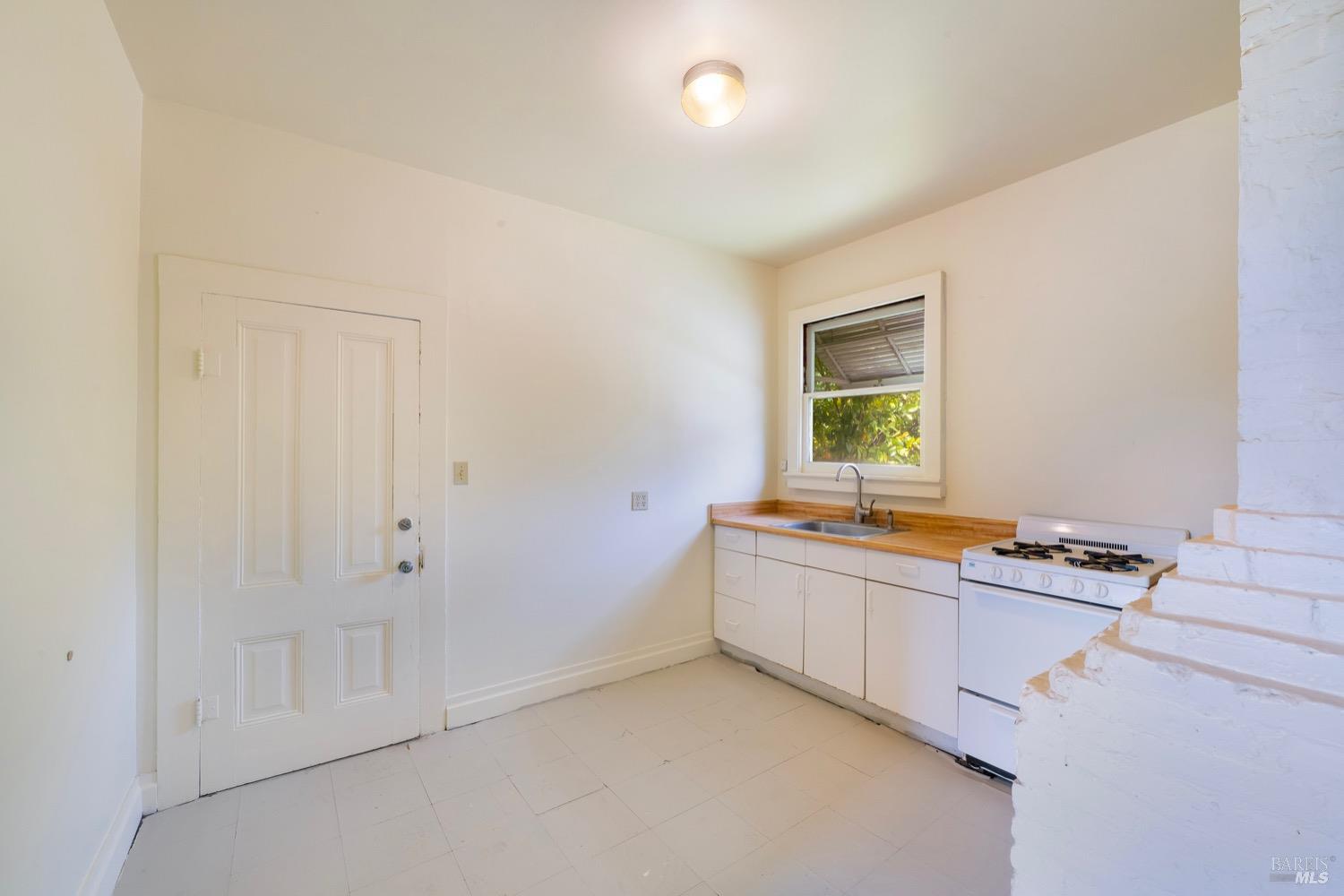 1664 Spring Street St. Helena, CA 94574 - Photo 14 of 27 a room with a window and a sink