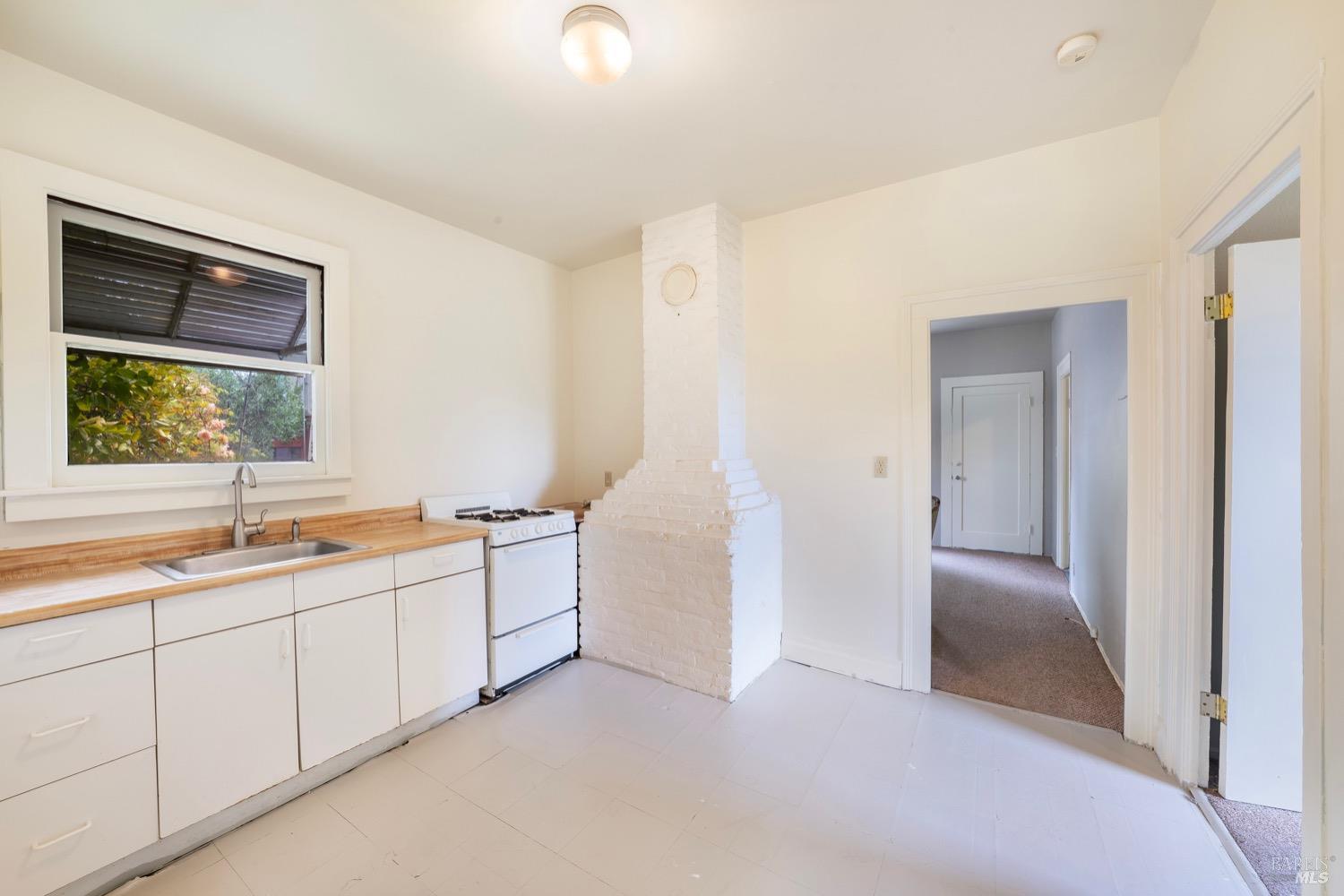 1664 Spring Street St. Helena, CA 94574 - Photo 15 of 27 a room with two sinks and a window