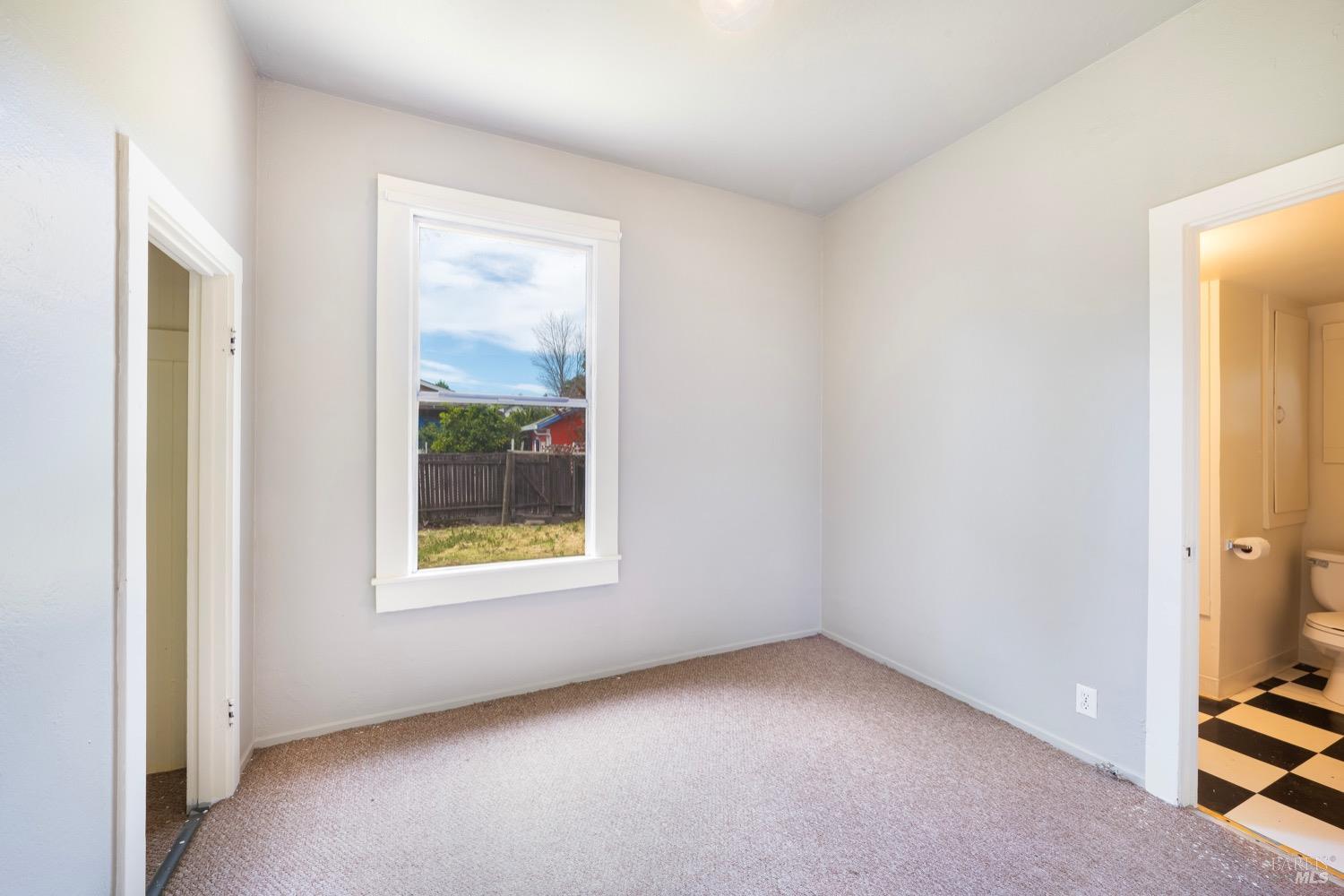 1664 Spring Street St. Helena, CA 94574 - Photo 16 of 27 an empty room with windows