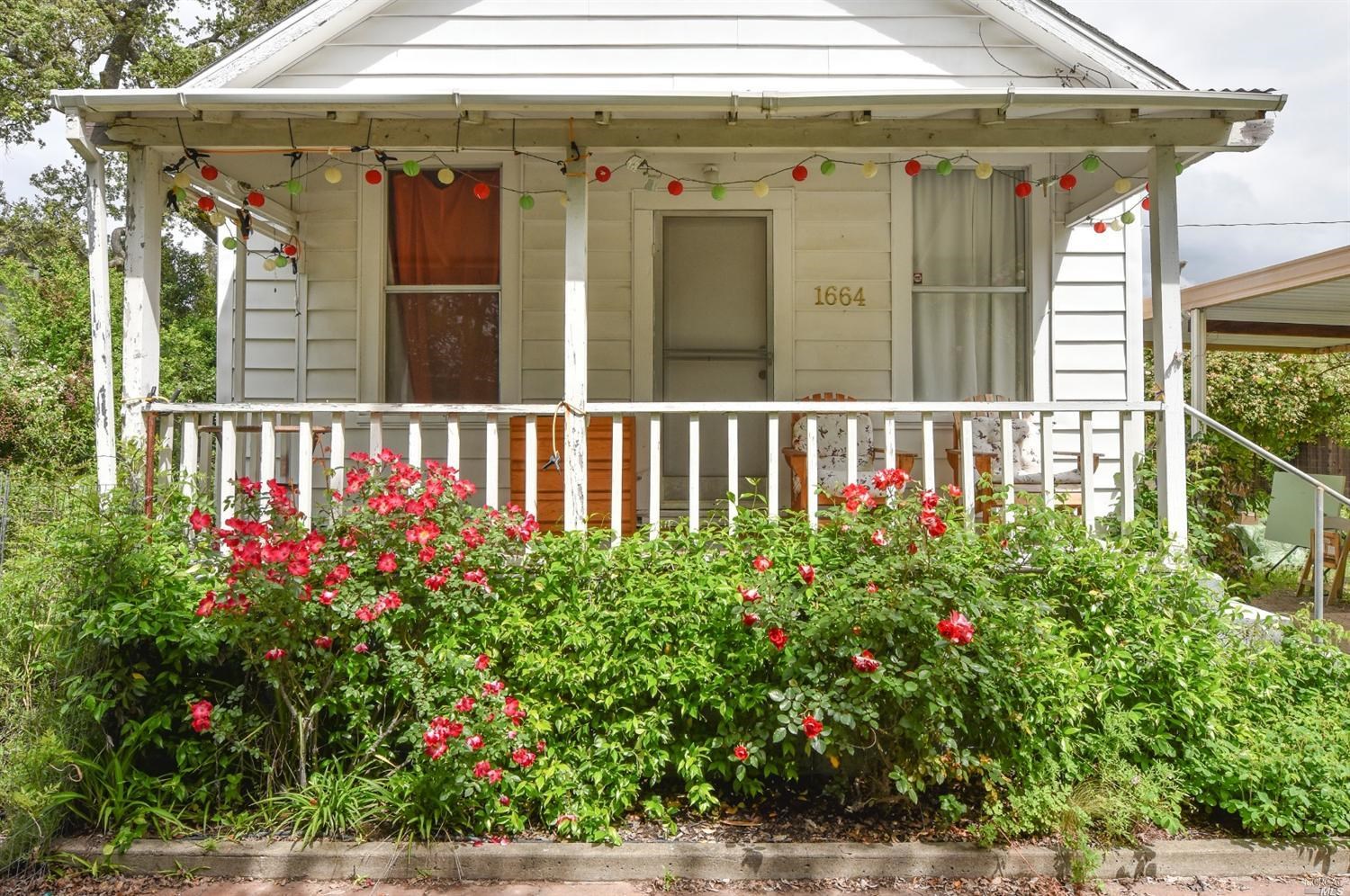 1664 Spring Street St. Helena, CA 94574 - Photo 2 of 27 a view of a porch with a bench