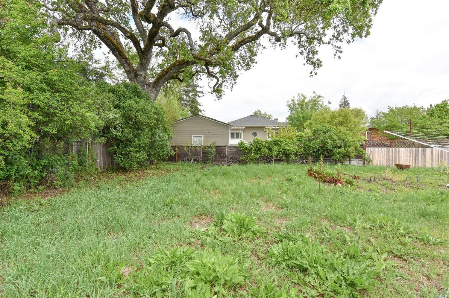1664 Spring Street St. Helena, CA 94574 - Photo 3 of 27 a front view of a house with garden