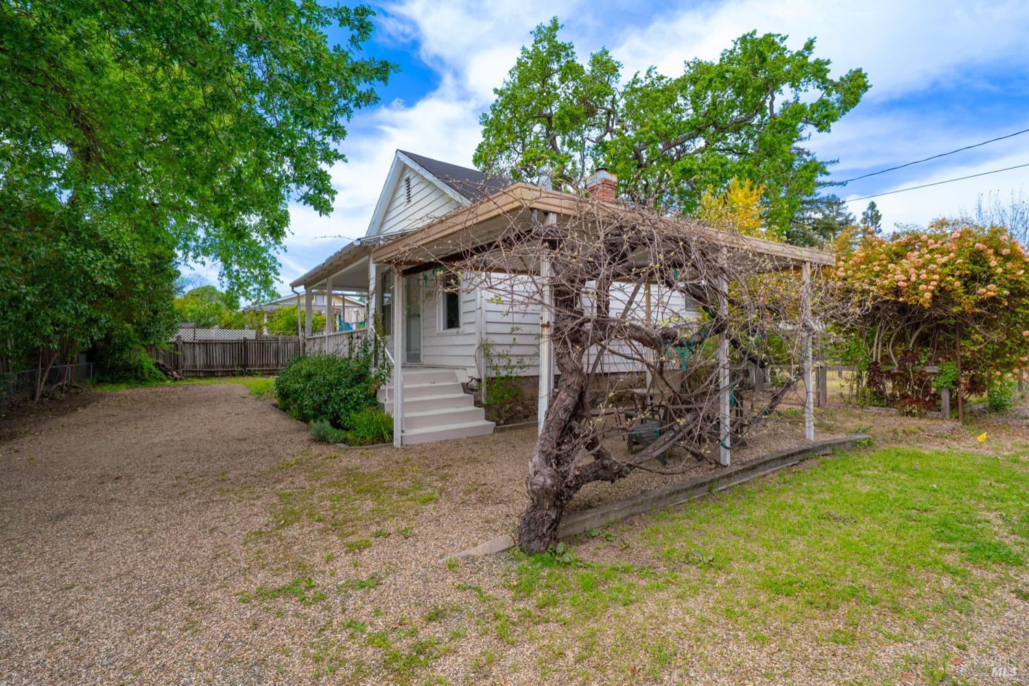 1664 Spring Street St. Helena, CA 94574 - Photo 6 of 27 a view of a house with a yard