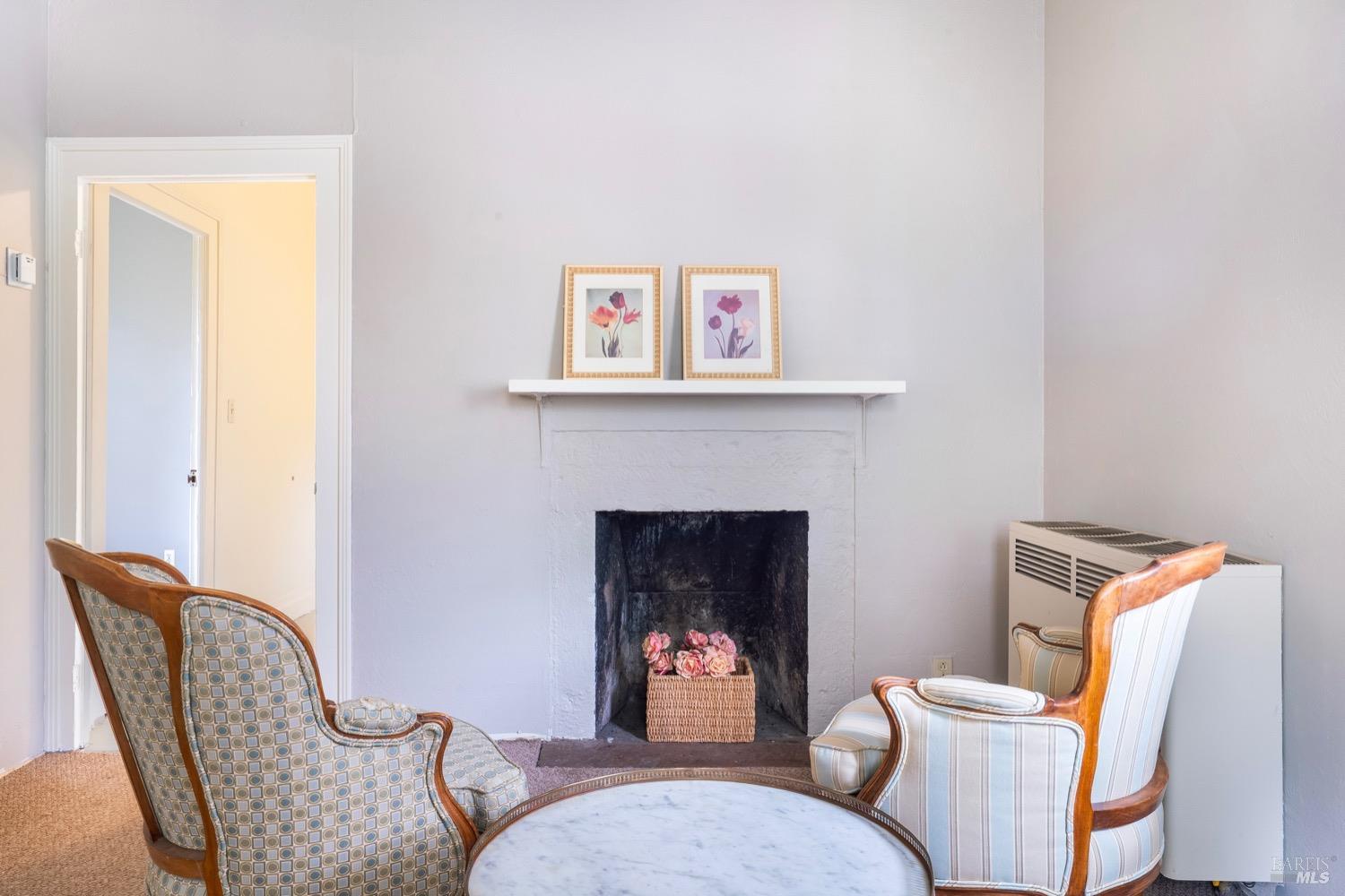 1664 Spring Street St. Helena, CA 94574 - Photo 10 of 27 a living room with furniture and a fireplace