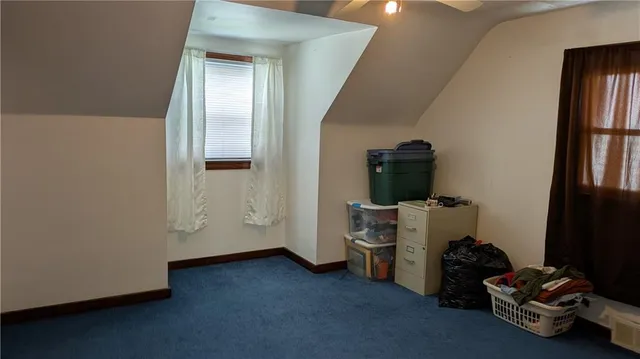 a room with a window and storage space