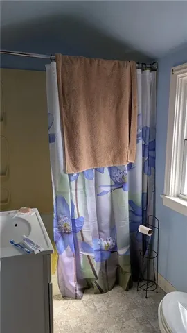 a bathroom with a sink and a toilet