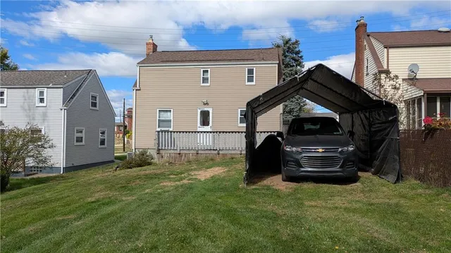 a front view of house with yard