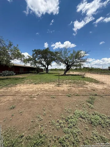 a view of a lake with a houses