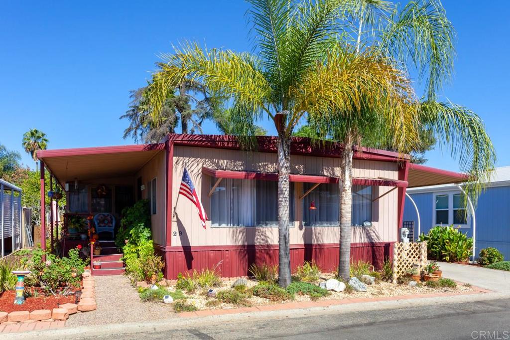 1120 East Mission Road, Unit SPC 29 Fallbrook, CA 92028 - Photo 1 of 1 a front view of multiple houses