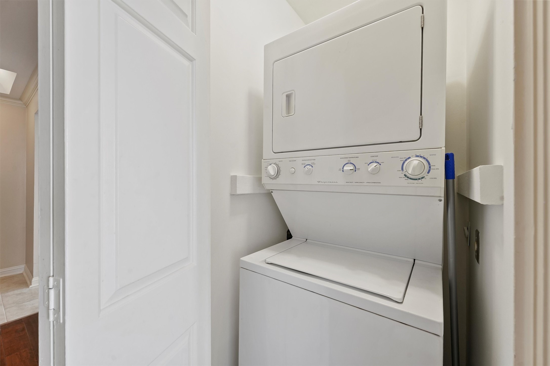 3350 McCue Road, Unit 2301 Houston, TX 77056 - Photo 17 of 31 a close up view of a washer and dryer