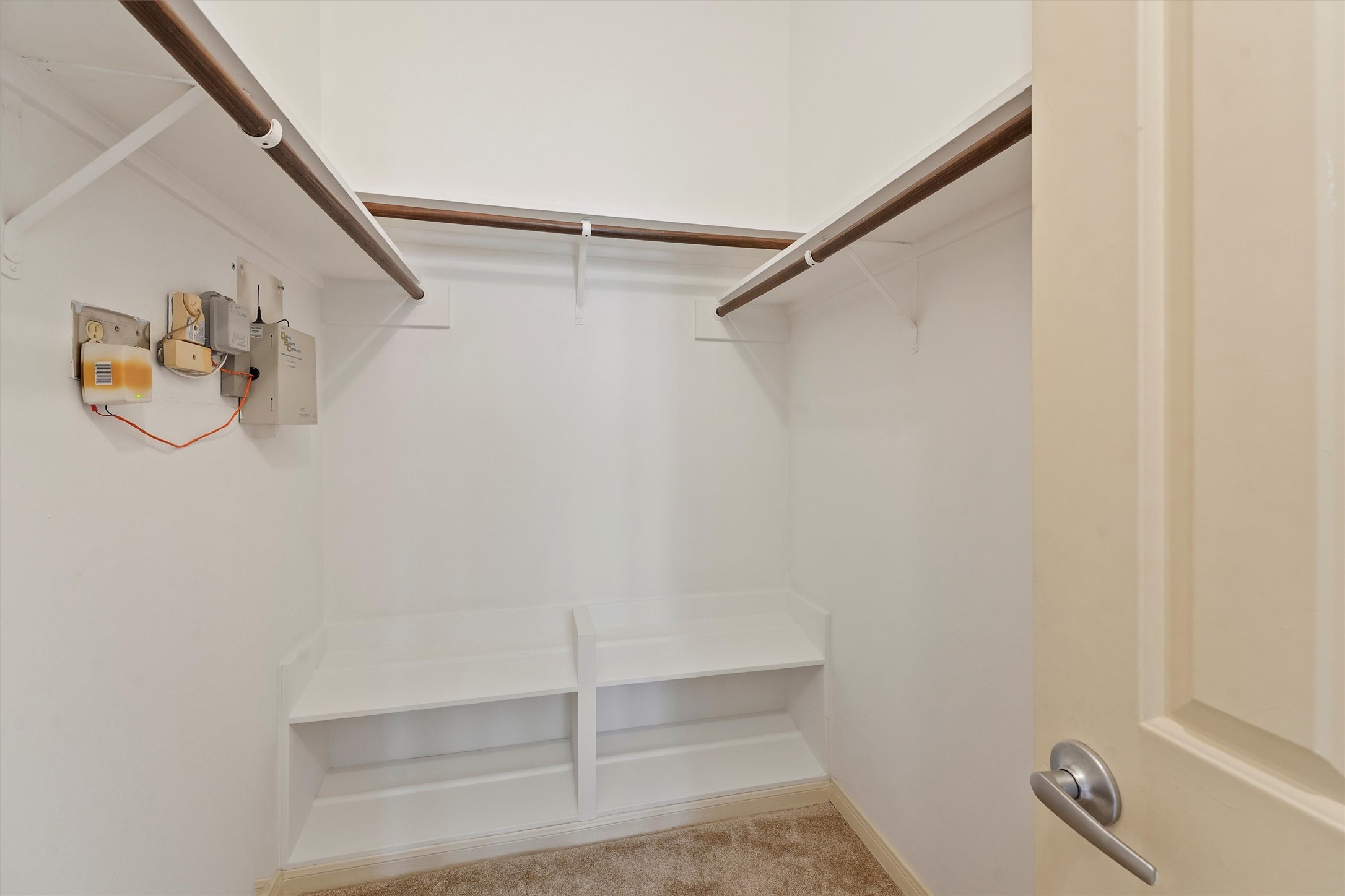 3350 McCue Road, Unit 2301 Houston, TX 77056 - Photo 20 of 31 a view of small space with racks on the wall