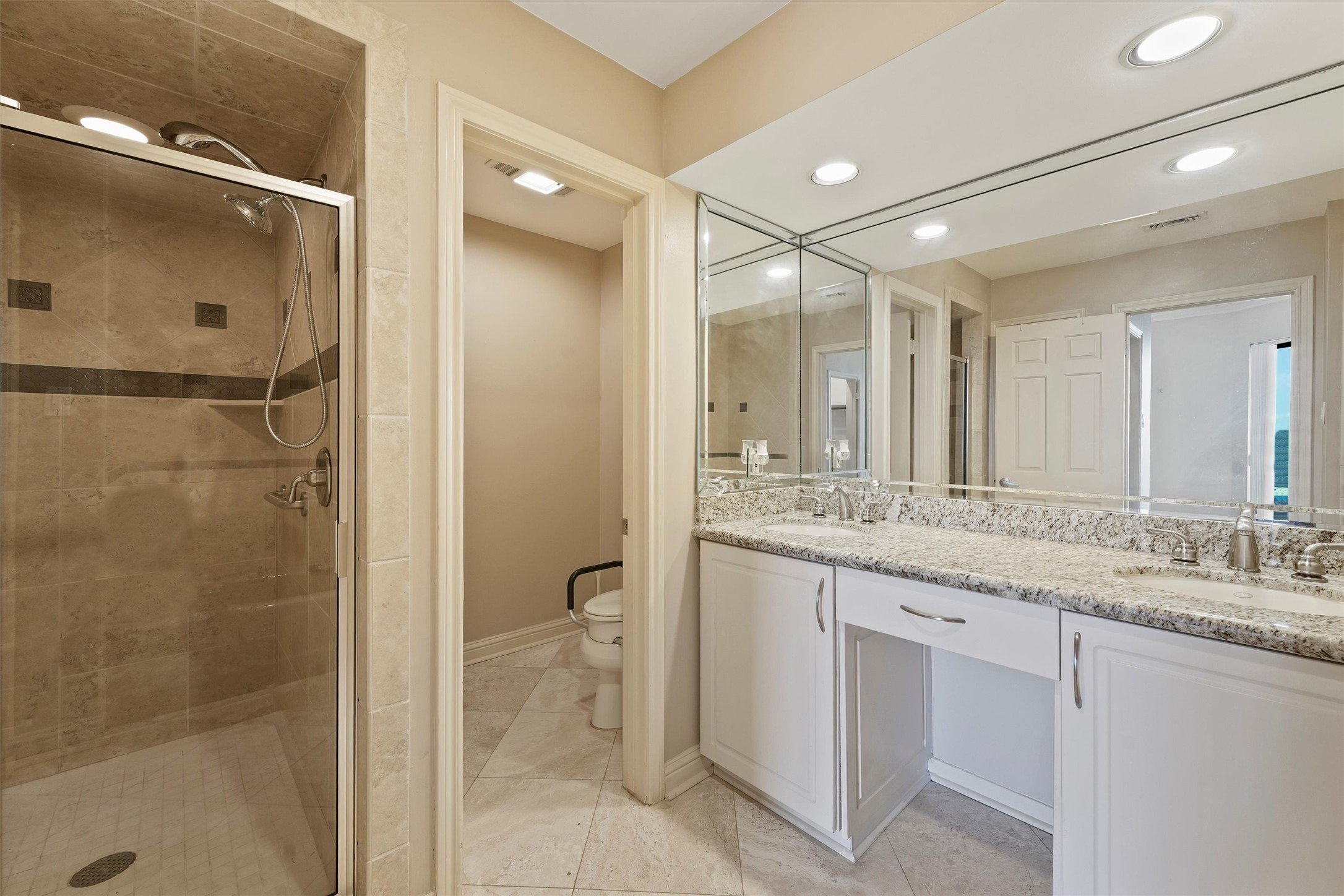 3350 McCue Road, Unit 2301 Houston, TX 77056 - Photo 23 of 31 a bathroom with a granite countertop sink mirror and double
