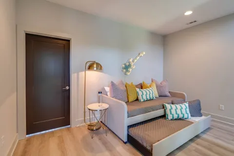 a living room with furniture and a couch