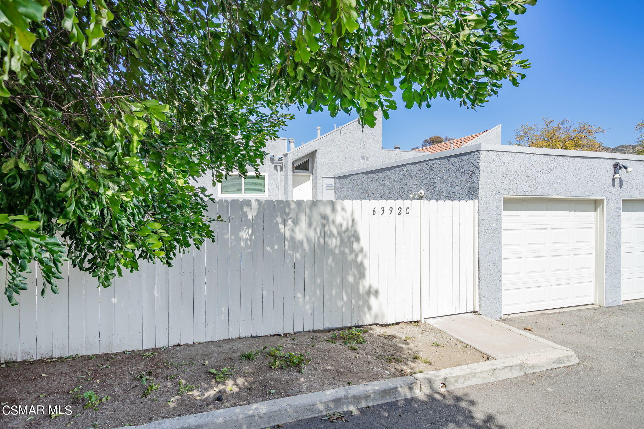 6392 Katherine Road, Unit C Simi Valley, CA 93063 - Photo 1 of 31 a view of a house with a tree