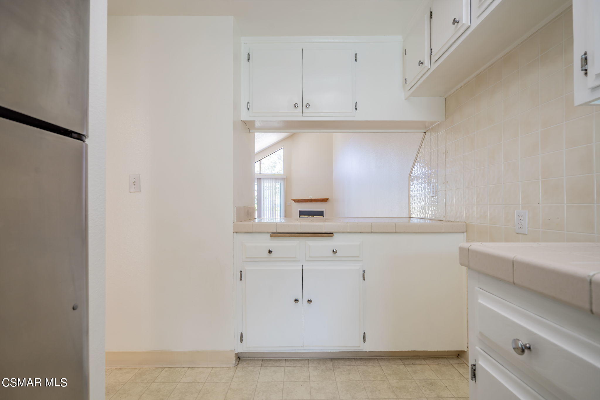 6392 Katherine Road, Unit C Simi Valley, CA 93063 - Photo 16 of 31 a view of cabinets and window