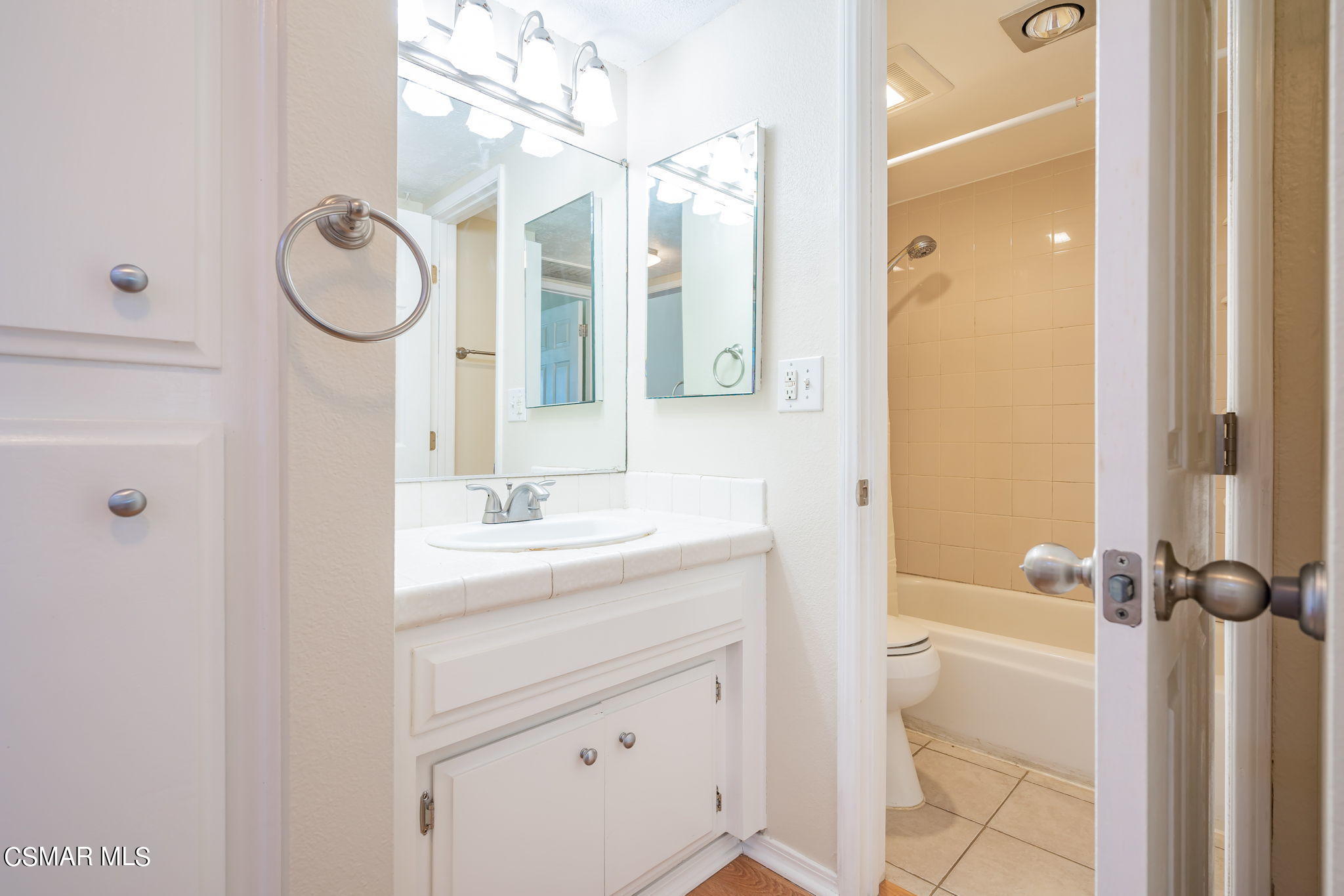 6392 Katherine Road, Unit C Simi Valley, CA 93063 - Photo 19 of 31 a bathroom with a granite countertop sink mirror and a shower