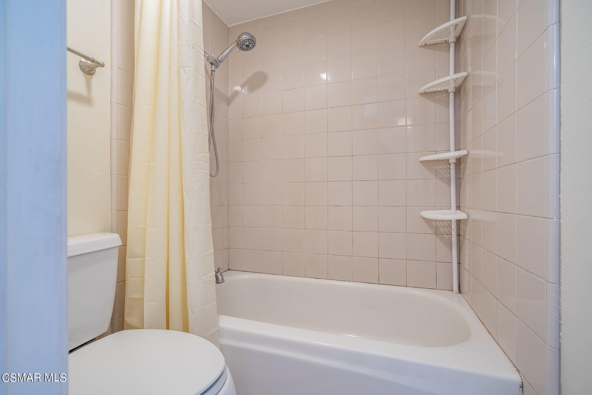 6392 Katherine Road, Unit C Simi Valley, CA 93063 - Photo 20 of 31 a white bath tub sitting next to a toilet