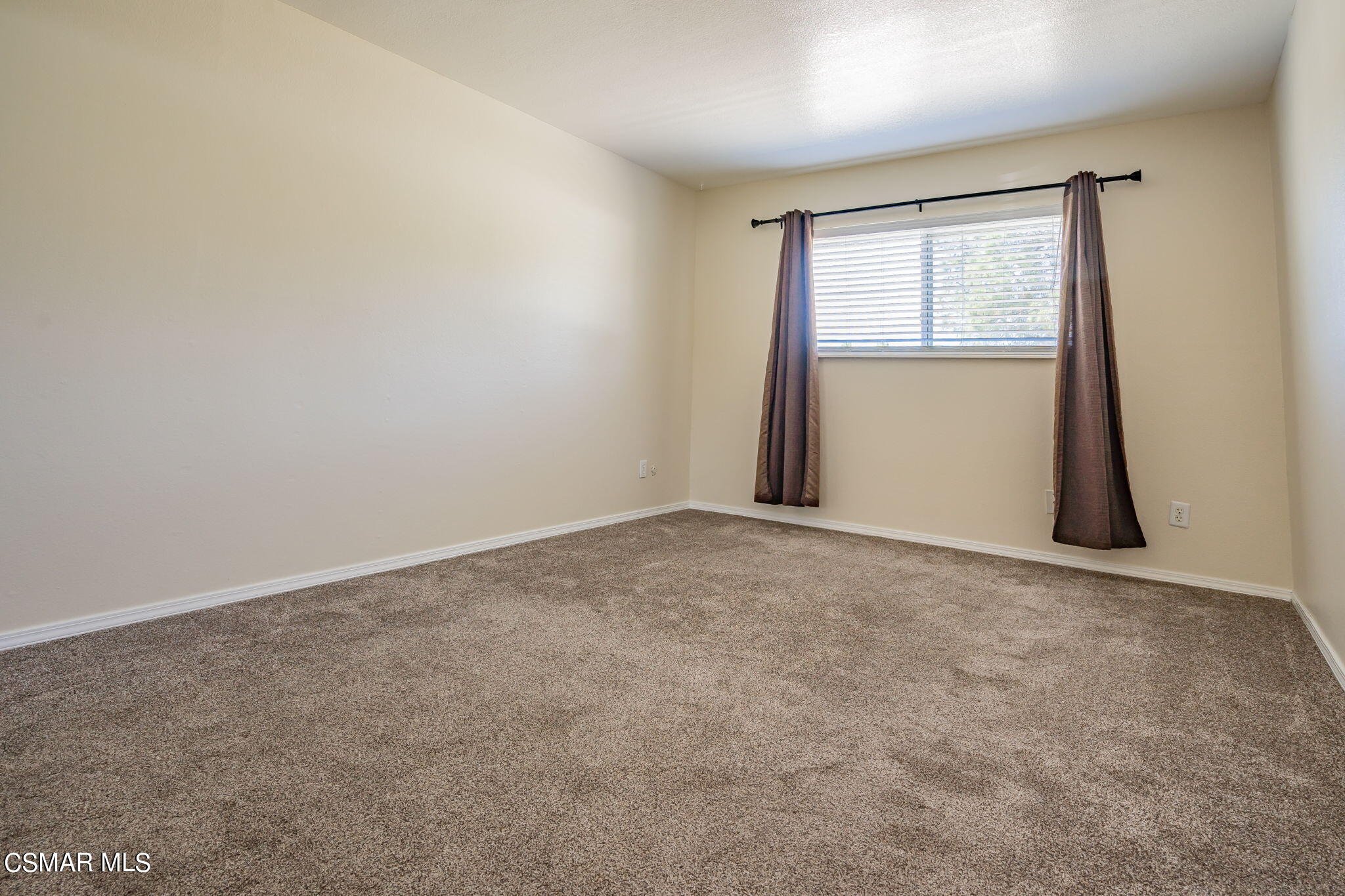 6392 Katherine Road, Unit C Simi Valley, CA 93063 - Photo 21 of 31 an empty room with a window