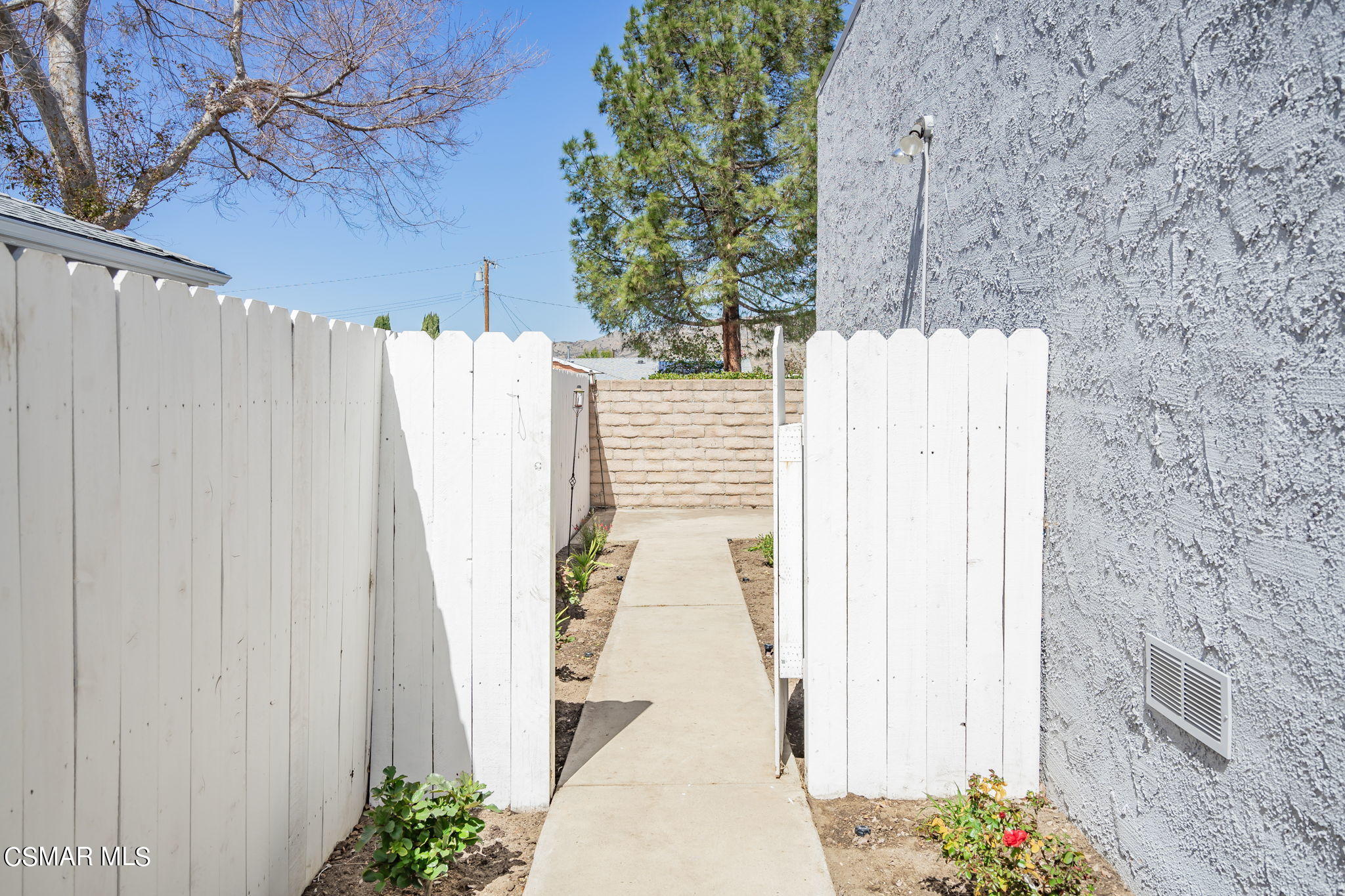6392 Katherine Road, Unit C Simi Valley, CA 93063 - Photo 27 of 31 a view of entryway with flower pots