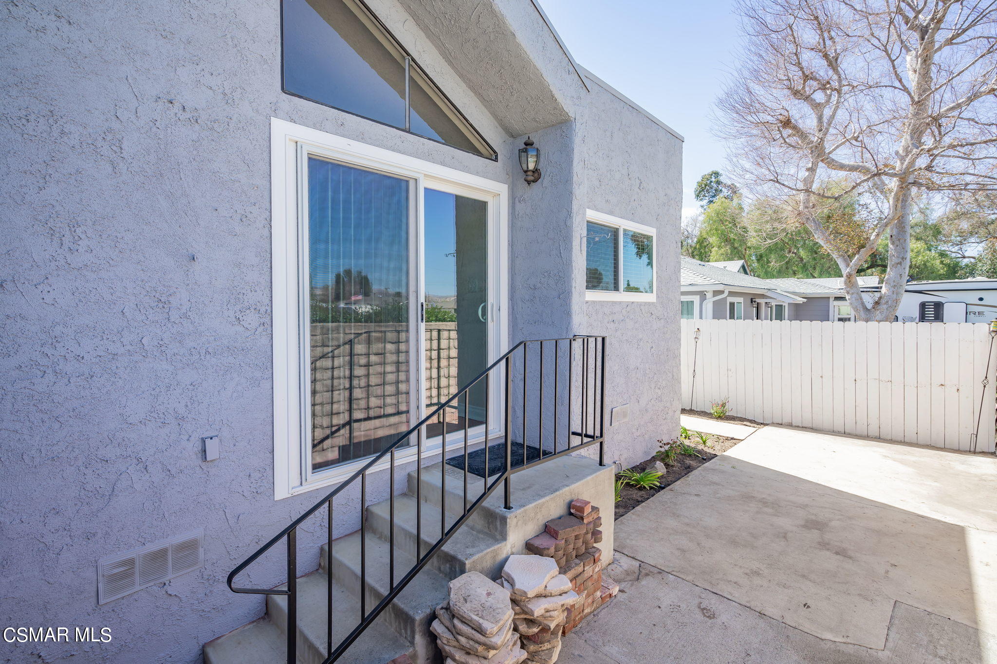 6392 Katherine Road, Unit C Simi Valley, CA 93063 - Photo 29 of 31 a view of backyard with deck and wooden fence
