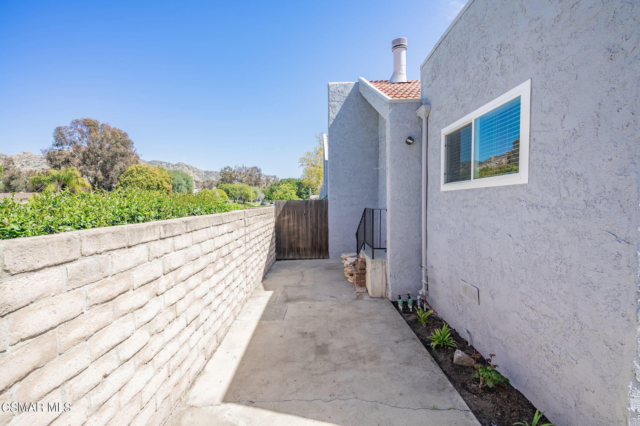 6392 Katherine Road, Unit C Simi Valley, CA 93063 - Photo 30 of 31 a house view with a garden space