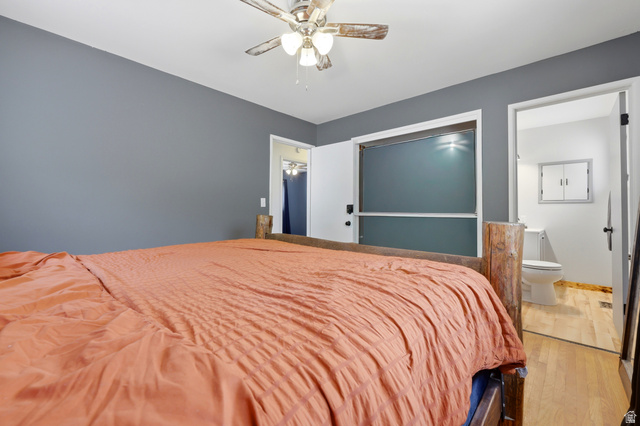 1486 3rd Street Ogden, UT 84404 - Photo 12 of 26 Bedroom featuring a ceiling fan, grey wall paint, and wood-finish flooring