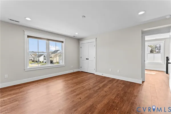 a view of entryway with wooden floor