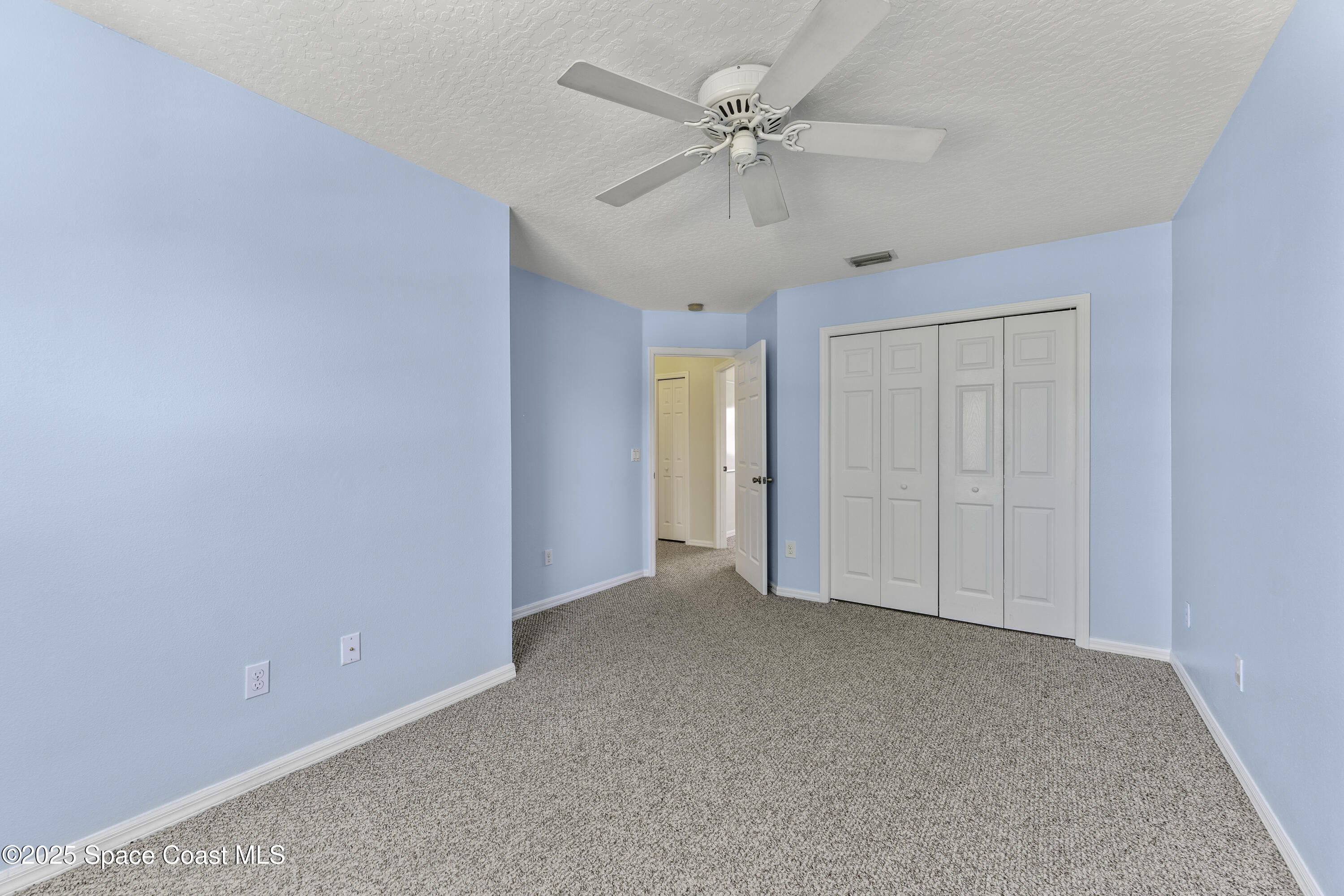 36 Sunset Street Satellite Beach, FL 32937 - Photo 27 of 45 a view of an empty room with a window