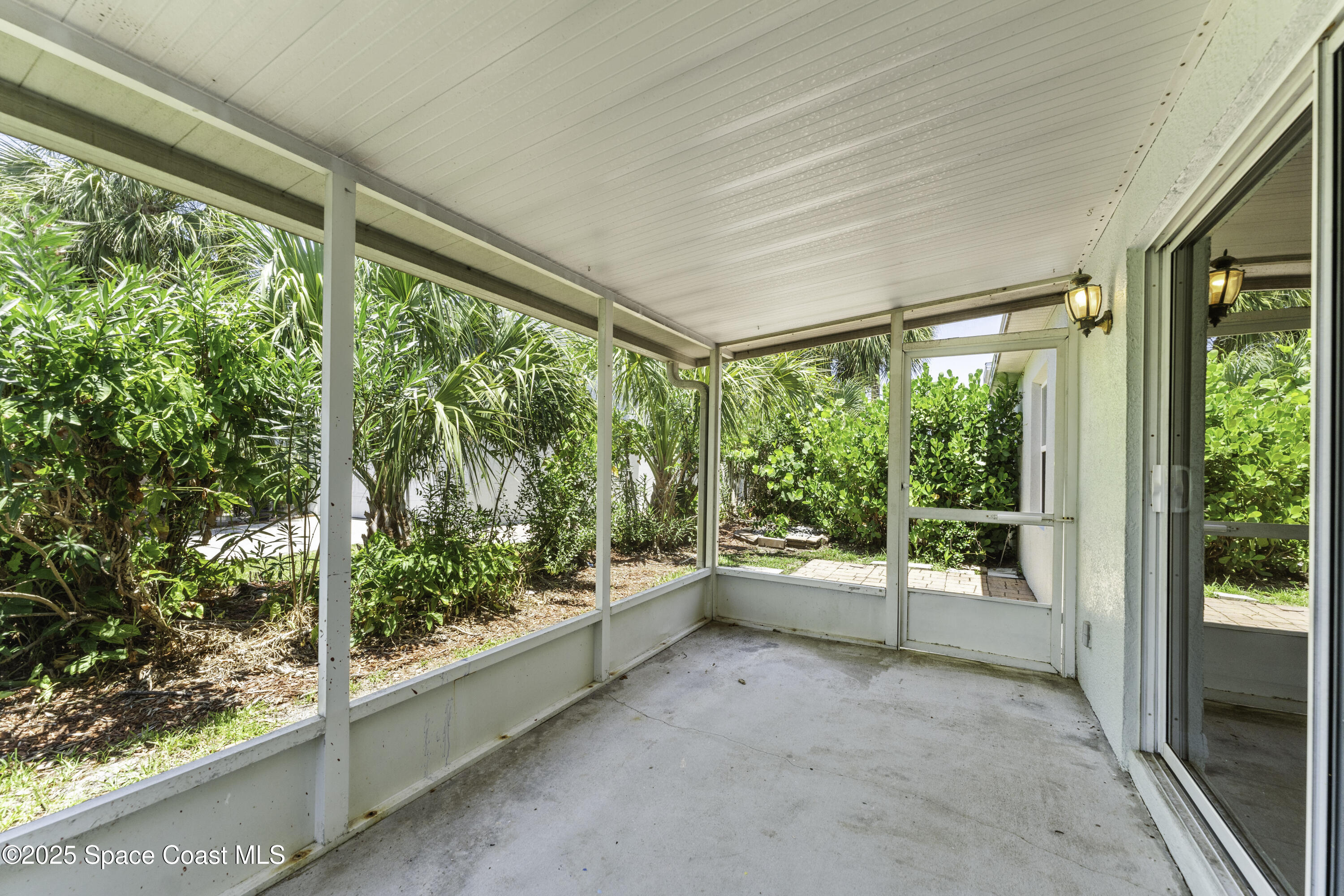 36 Sunset Street Satellite Beach, FL 32937 - Photo 31 of 45 a view of room with green walls