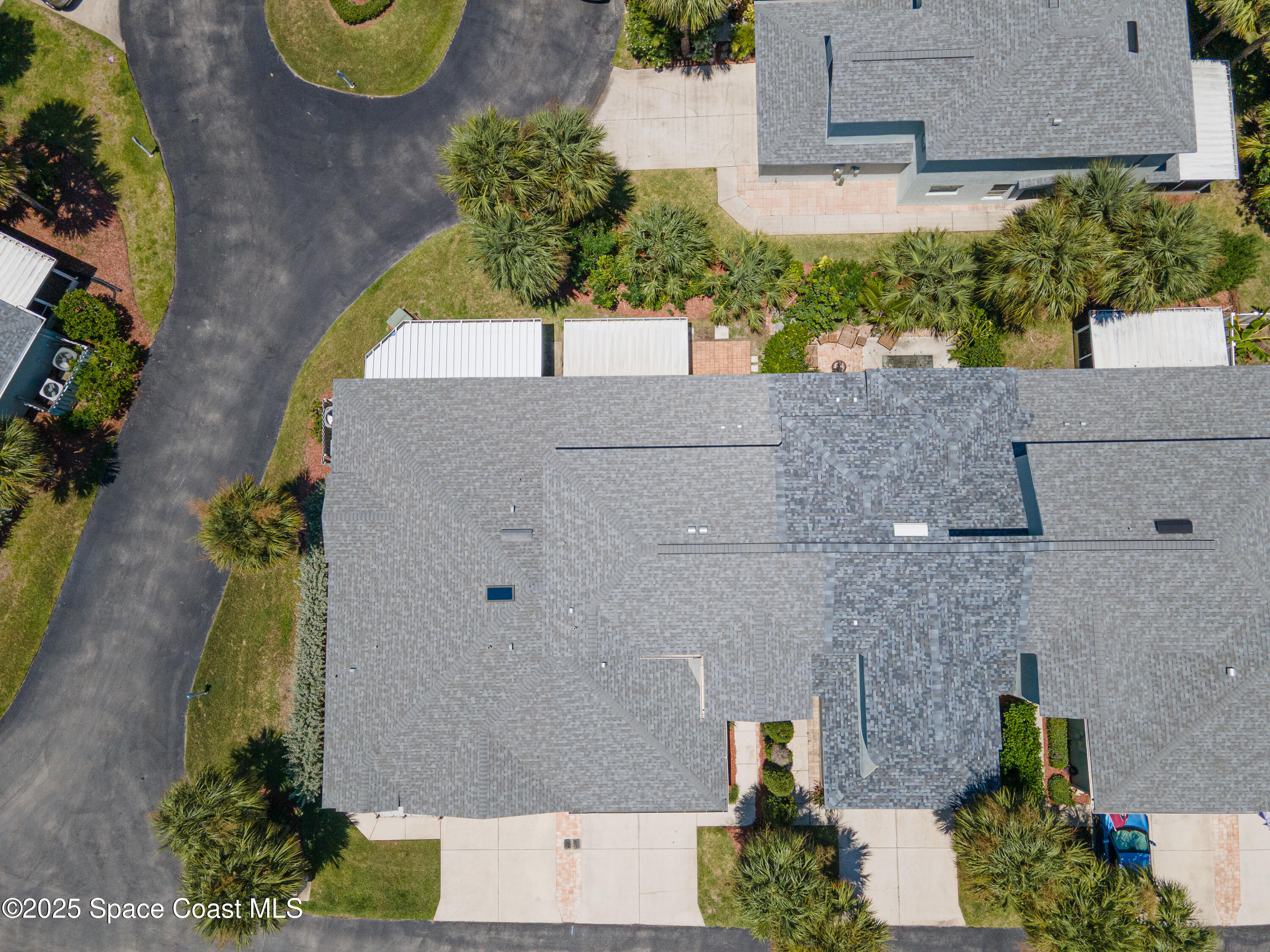 36 Sunset Street Satellite Beach, FL 32937 - Photo 4 of 45 an aerial view of a house with a swimming pool
