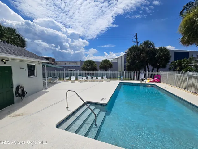 a view of outdoor space yard deck patio and swimming pool