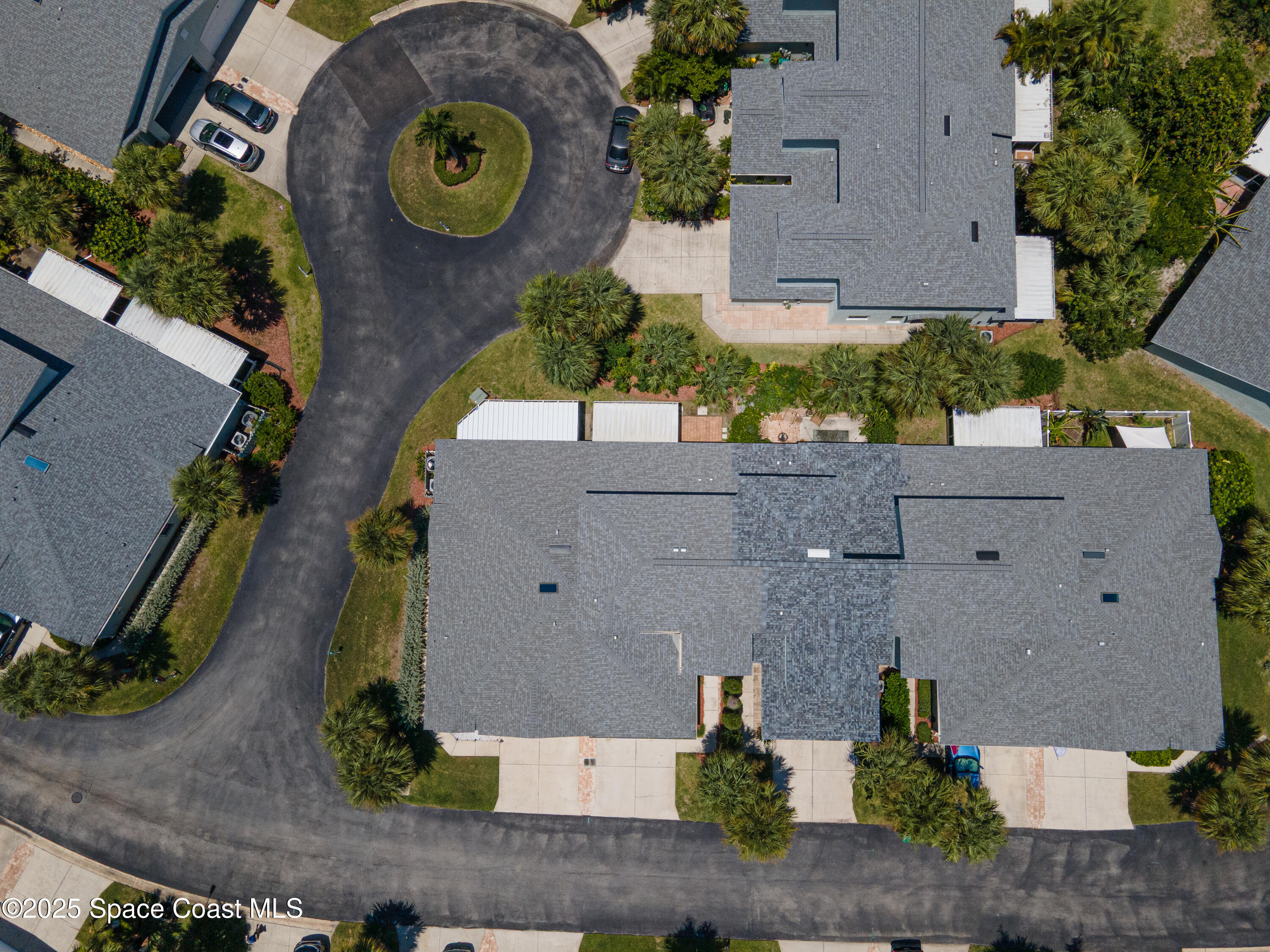 36 Sunset Street Satellite Beach, FL 32937 - Photo 5 of 45 an aerial view of residential house with outdoor space and parking