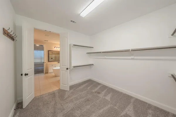 a view of a room with an empty space