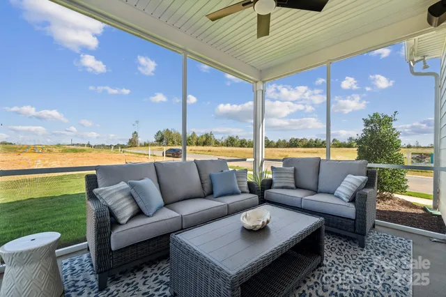 a view of a patio with couches and a table