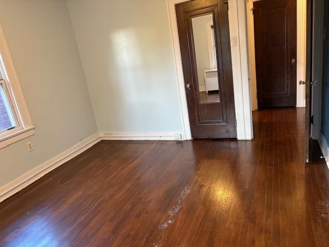 5648 Melvin Street Pittsburgh, PA 15217 - Photo 16 of 22 an empty room with wooden floor and closet
