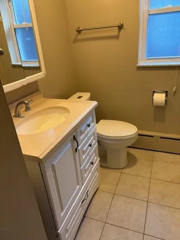 a bathroom with a sink and toilet