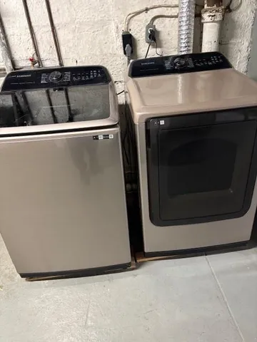 a utility room with washing machine