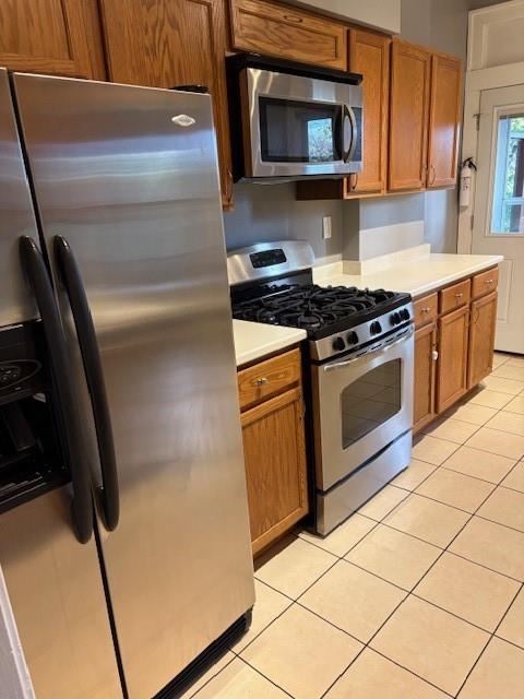 5648 Melvin Street Pittsburgh, PA 15217 - Photo 9 of 22 a kitchen with granite countertop cabinets and steel stainless steel appliances