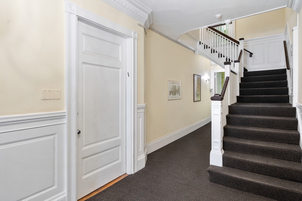 37 Bay State Road, Unit 3 Boston, MA 02215 - Photo 15 of 18 a view of entryway and hall with wooden floor