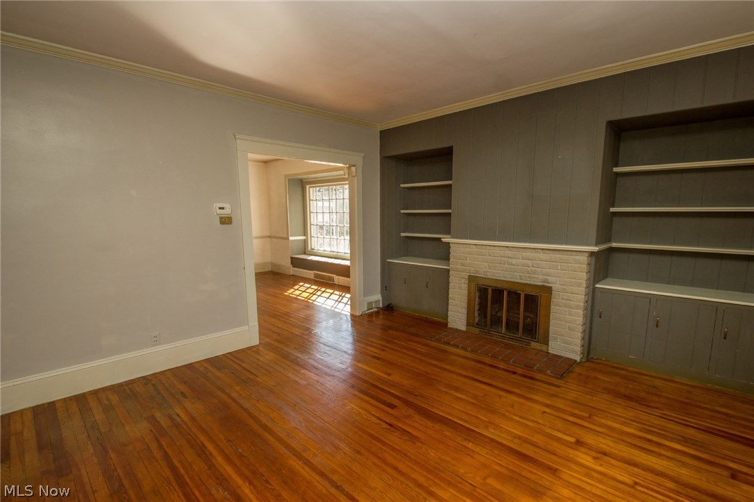 1629 Crest Road Cleveland Heights, OH 44121 - Photo 8 of 29 Living room with built-ins and fireplace.