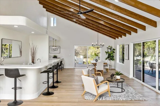 a view of a living room and dining room