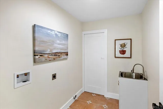 a black and white photo of a refrigerator