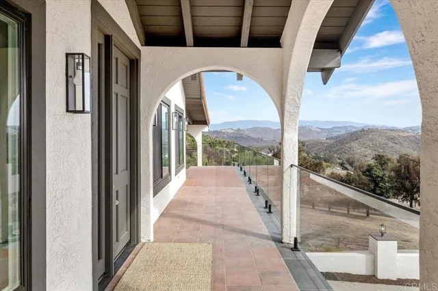 a bedroom with furniture and a clock